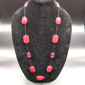 Statement Silver Toned Necklace With Red Multi Faceted Beads